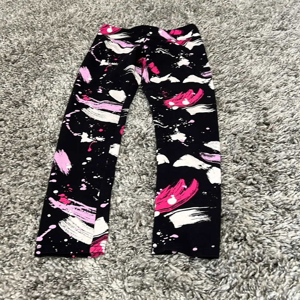 Black Leggings with pink, purple, and white stripes